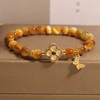 Four-Leaf Clover Tiger's Eye Bracelet | A Lucky Amulet for Feng Shui Balance