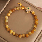 Four-Leaf Clover Tiger's Eye Bracelet | A Lucky Amulet for Feng Shui Balance
