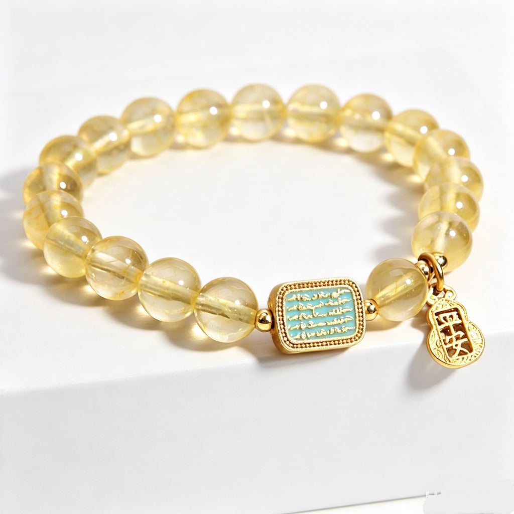 Extreme close-up of natural clear citrine beads with warm golden transparent luster, Metal Balance women bracelet texture detail, plain white background