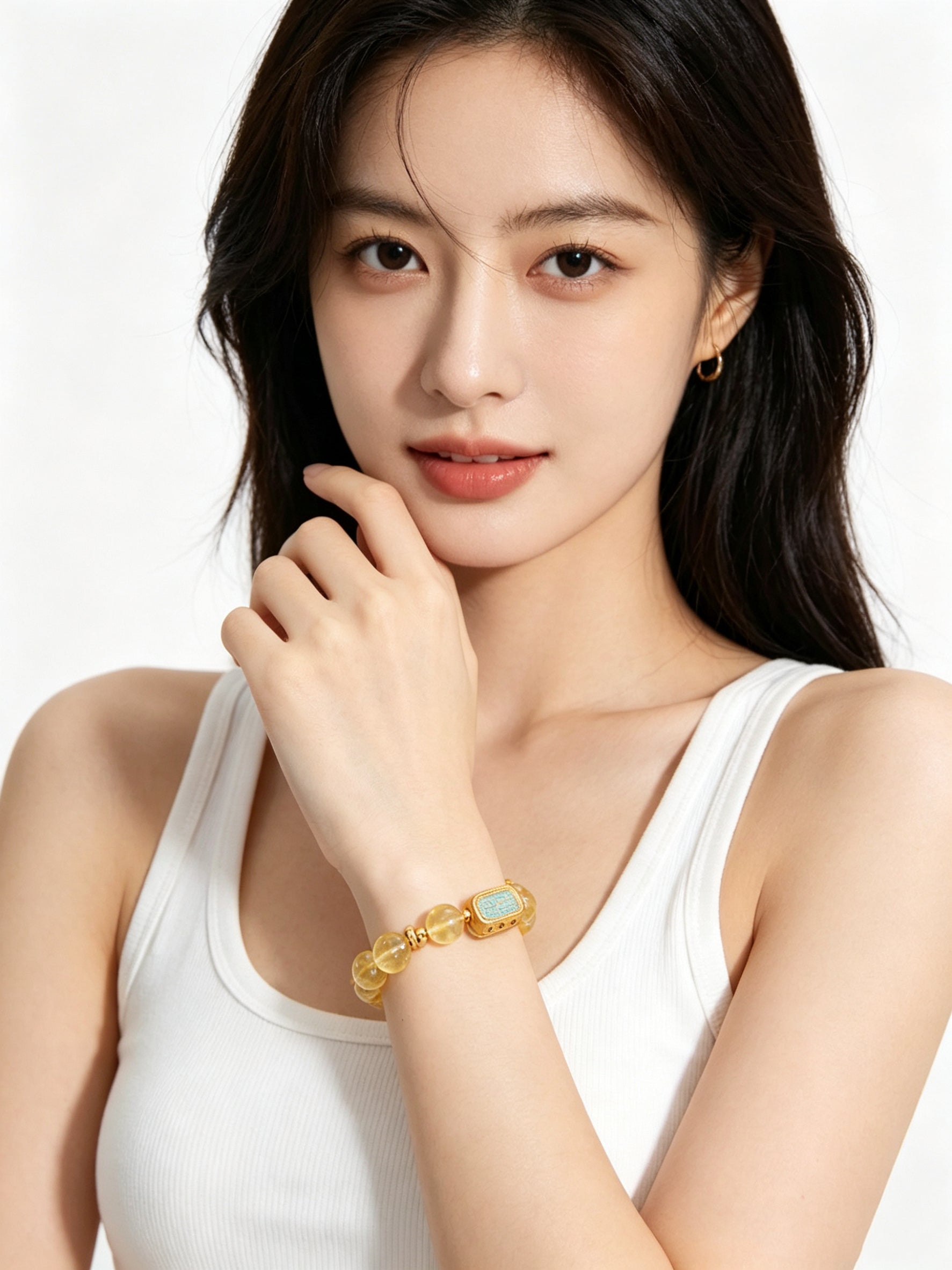 Close-up of female hand gently displaying Metal Balance five-element citrine bracelet, plain white outfit, no additional jewelry, minimalist white studio background