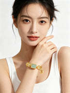 Close-up of female hand gently displaying Metal Balance five-element citrine bracelet, plain white outfit, no additional jewelry, minimalist white studio background2