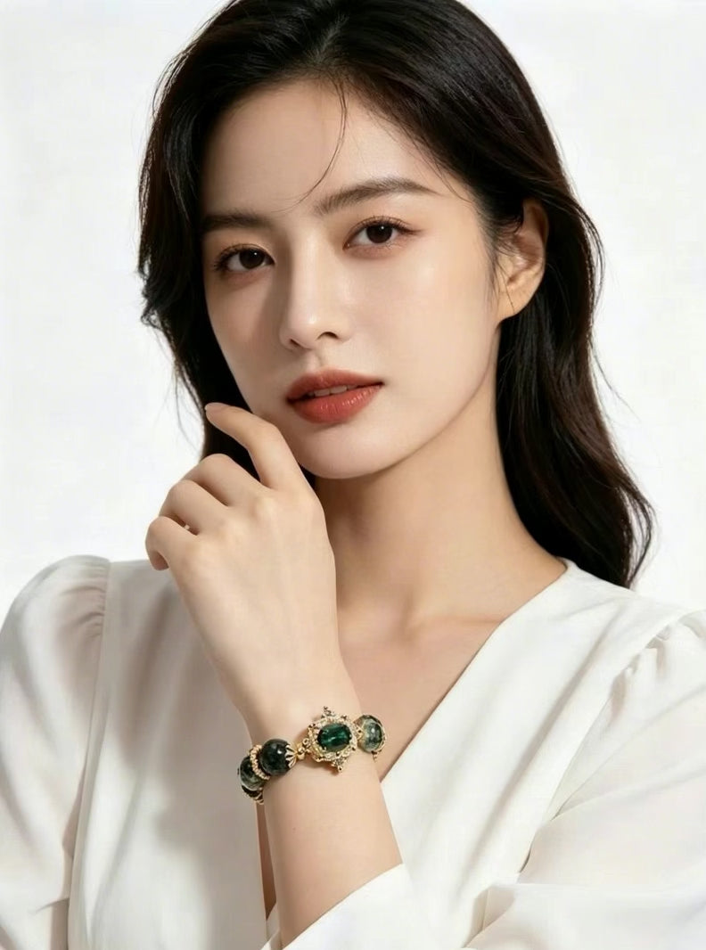 Vertical e-commerce short video of Wooden Growth green phantom bracelet as friendship & girlfriend gift, female model in white top, minimalist pure white backdrop, delicate oriental crystal jewelry display